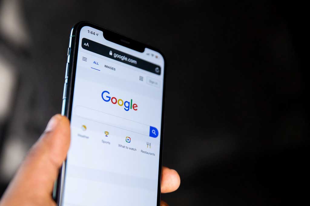Hand holding smart phone Hand holding smart phone